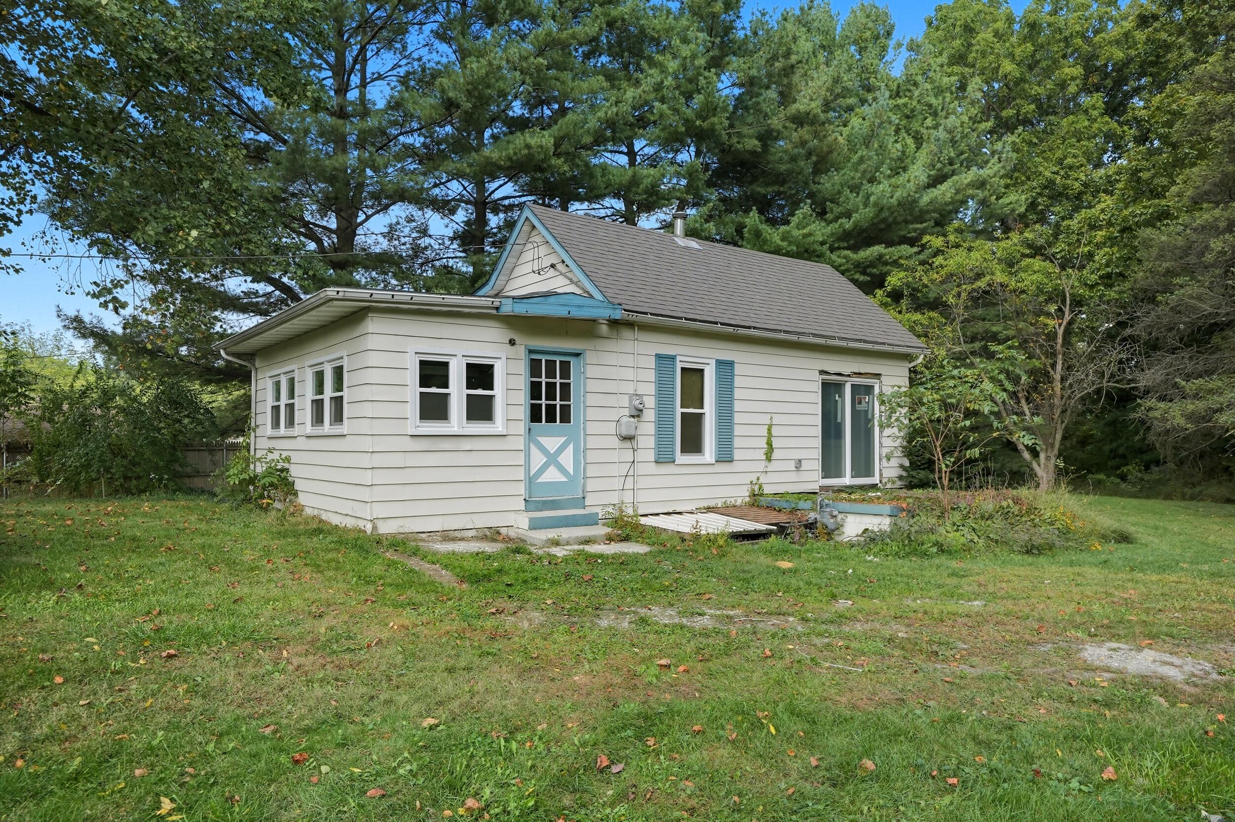 450 East Greening Road Chesterton, IN 46304 - Photo 31 of 56 a white house that has a tree in it