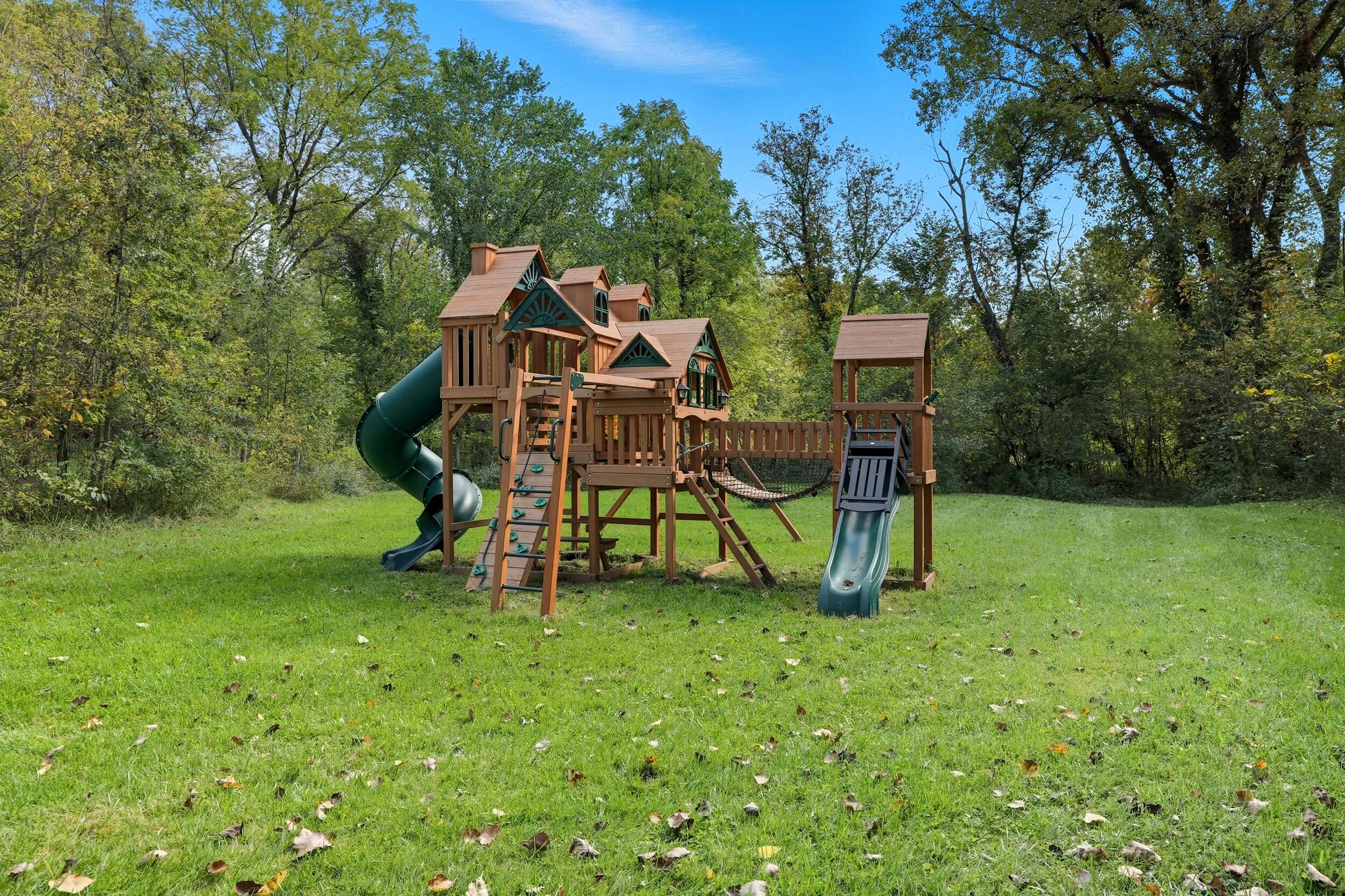 450 East Greening Road Chesterton, IN 46304 - Photo 40 of 56 a view of a two chairs in the garden