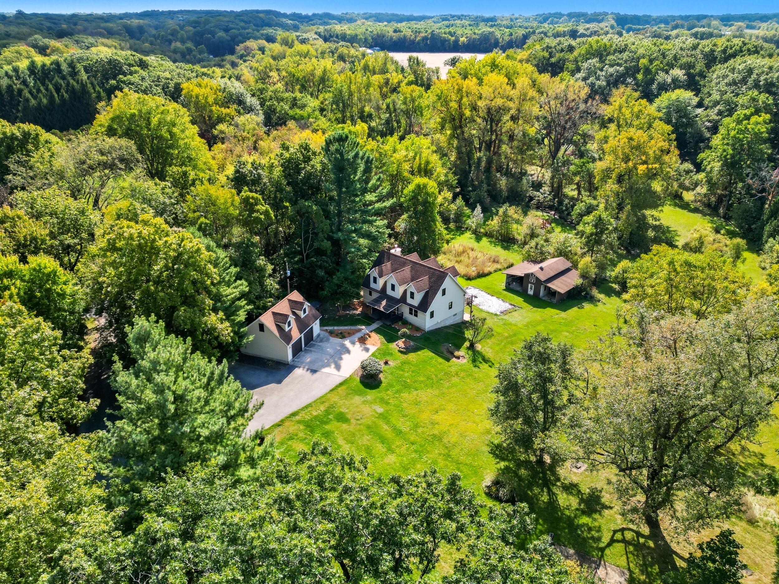 450 East Greening Road Chesterton, IN 46304 - Photo 42 of 56 a backyard of a house with lots of green space