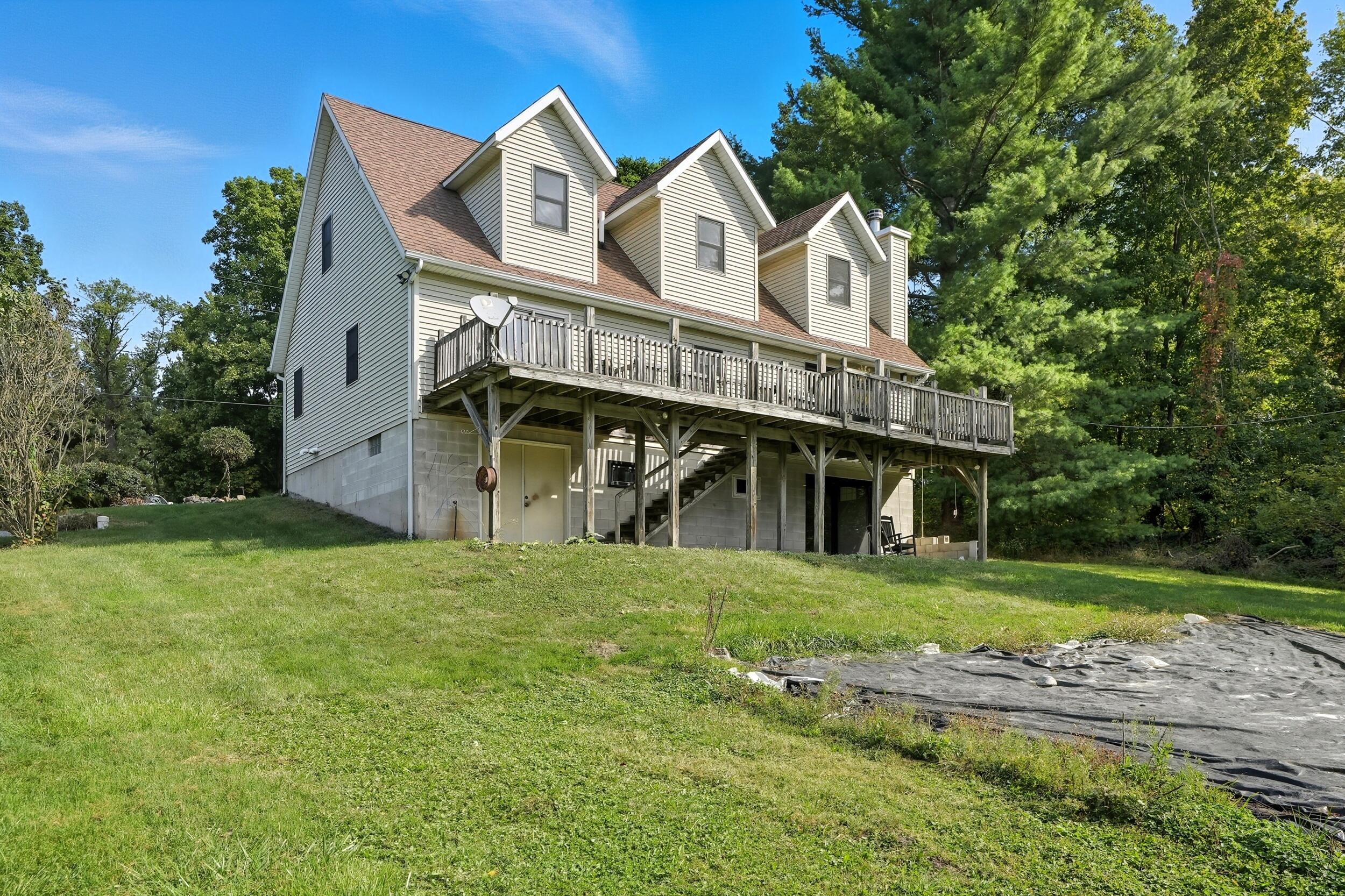 450 East Greening Road Chesterton, IN 46304 - Photo 56 of 56 a view of a big house with a big yard and large trees