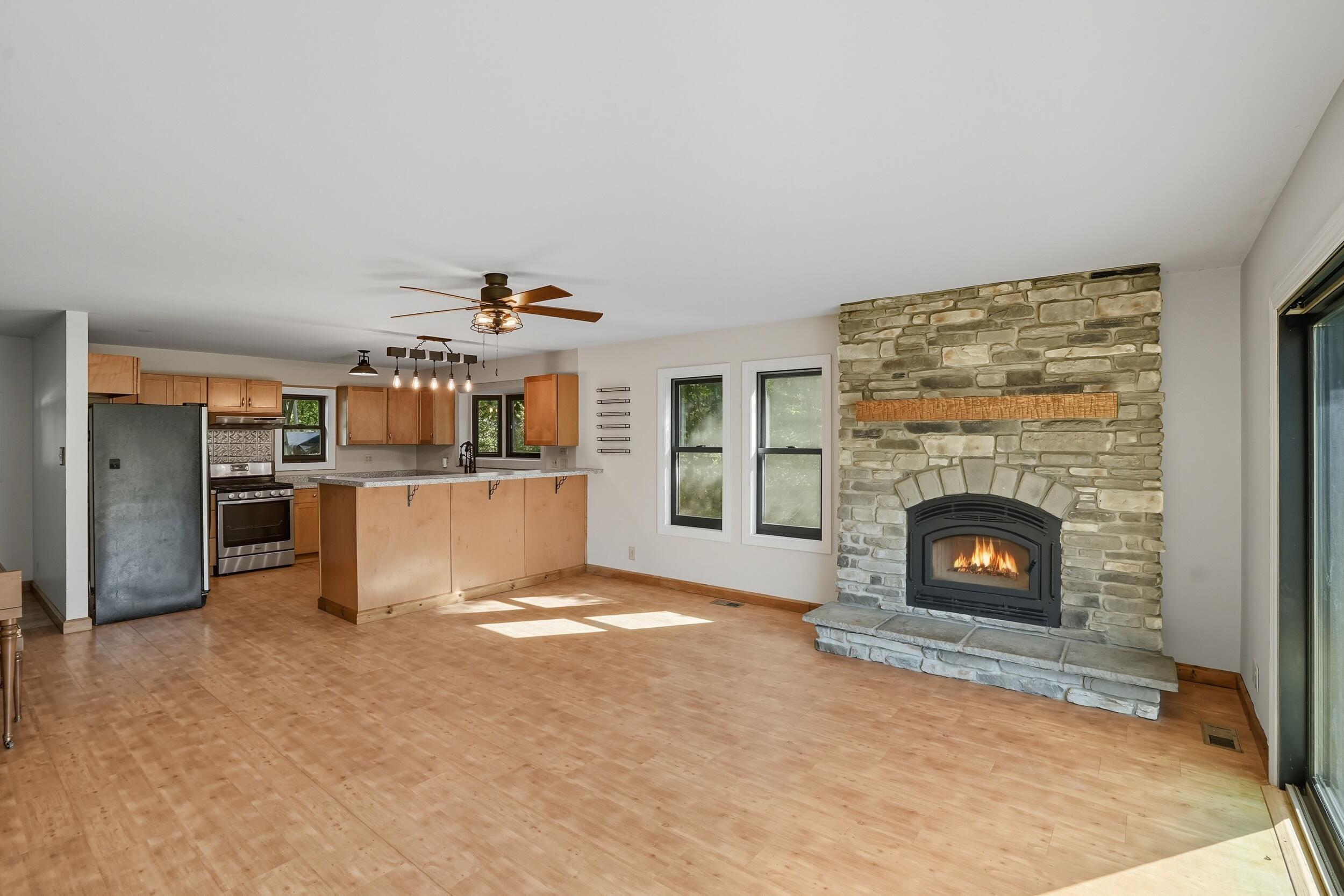 450 East Greening Road Chesterton, IN 46304 - Photo 7 of 56 a view of a livingroom with a fireplace and a fireplace