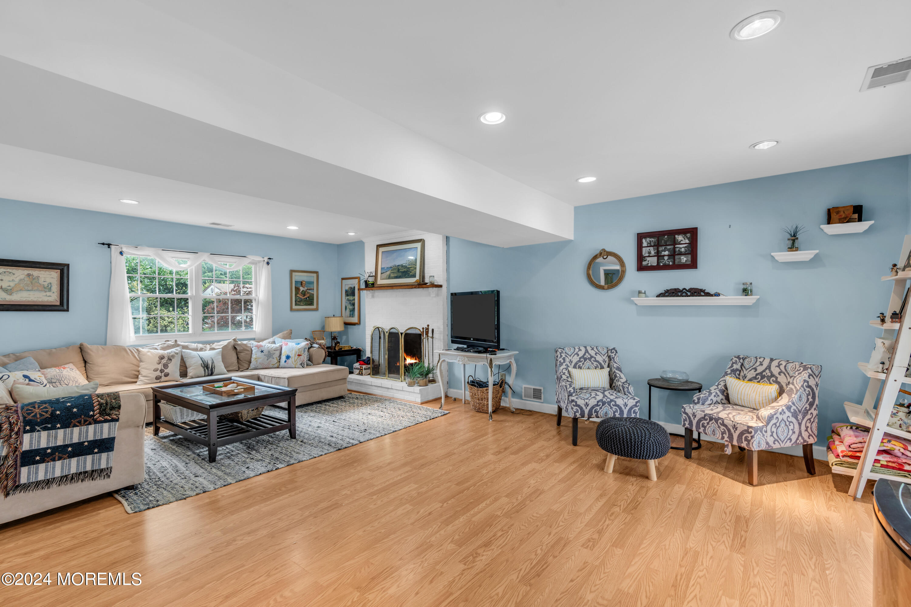 332 Emberly Road Brick, NJ 08723 - Photo 11 of 50 a living room with furniture and a flat screen tv