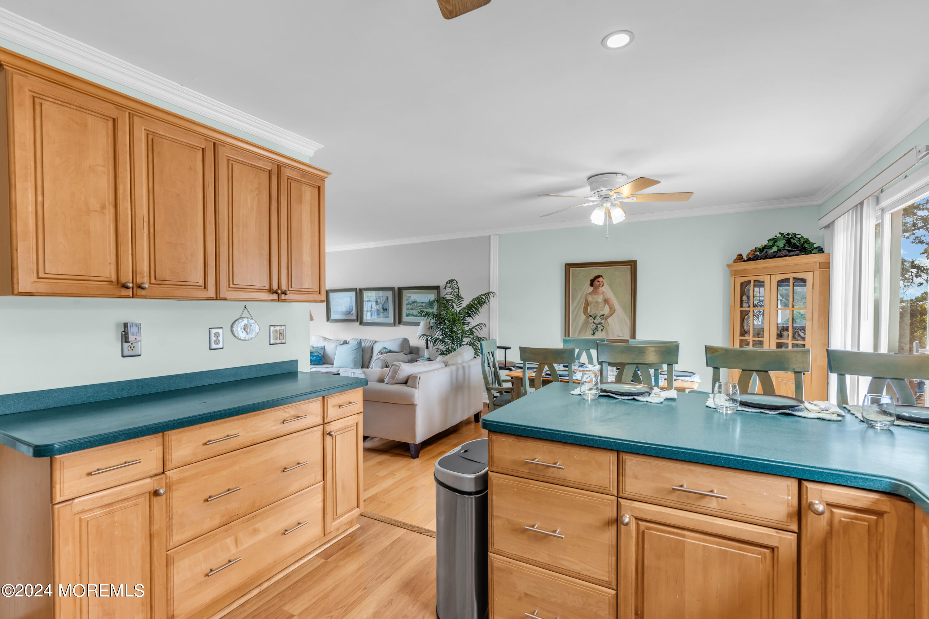 332 Emberly Road Brick, NJ 08723 - Photo 18 of 50 a kitchen with sink cabinets and living room view