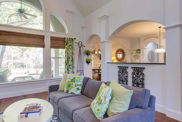 a kitchen with stainless steel appliances granite countertop a sink a stove counter space and cabinets