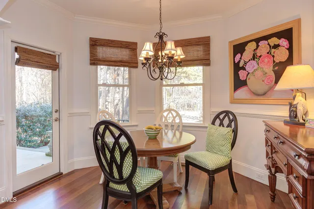 a white bath tub sitting next to a window