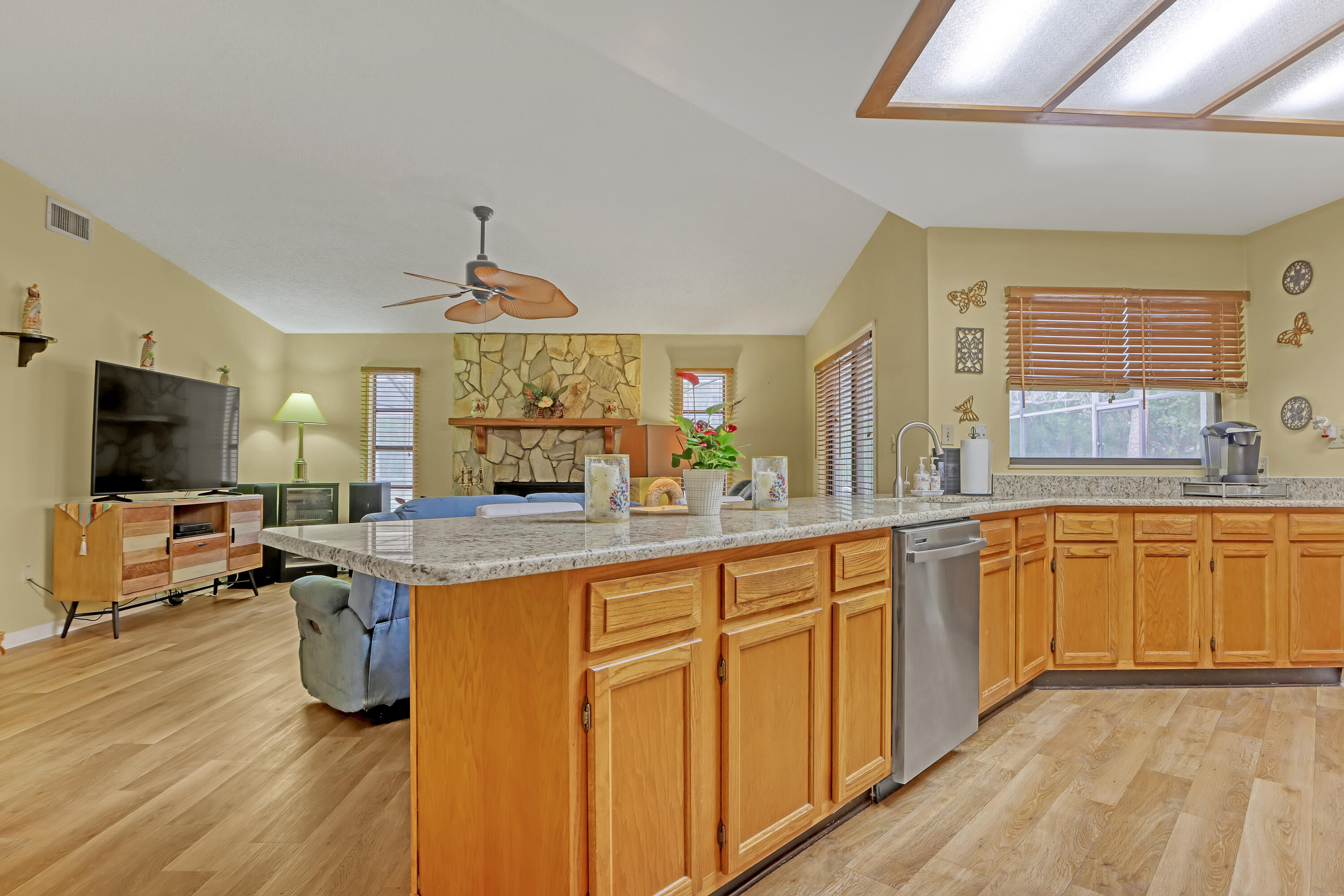 2160 Winston Drive Cocoa, FL 32926 - Photo 17 of 52 a kitchen with sink and view of living room