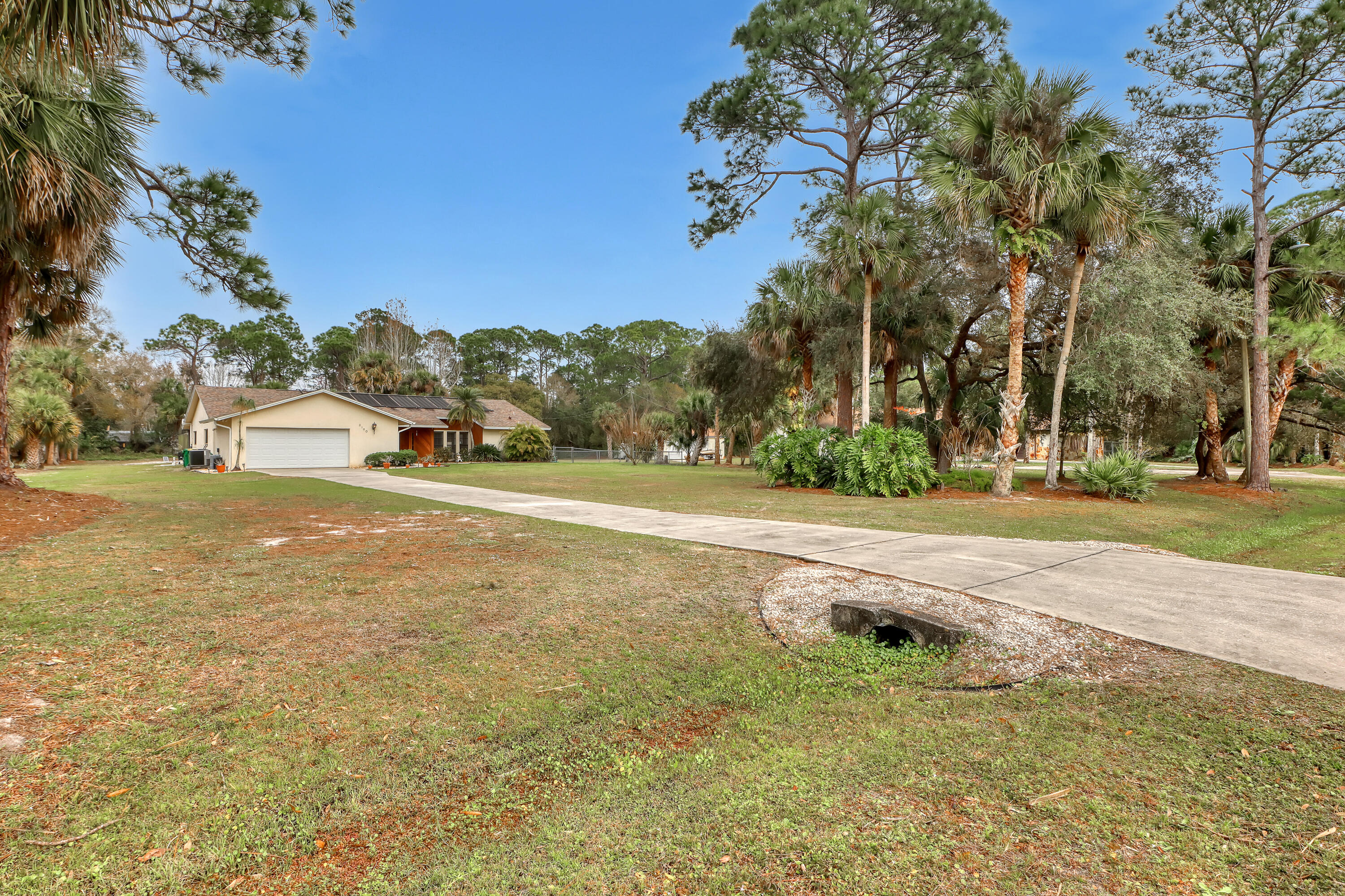 2160 Winston Drive Cocoa, FL 32926 - Photo 2 of 52 a view of an outdoor space and a yard