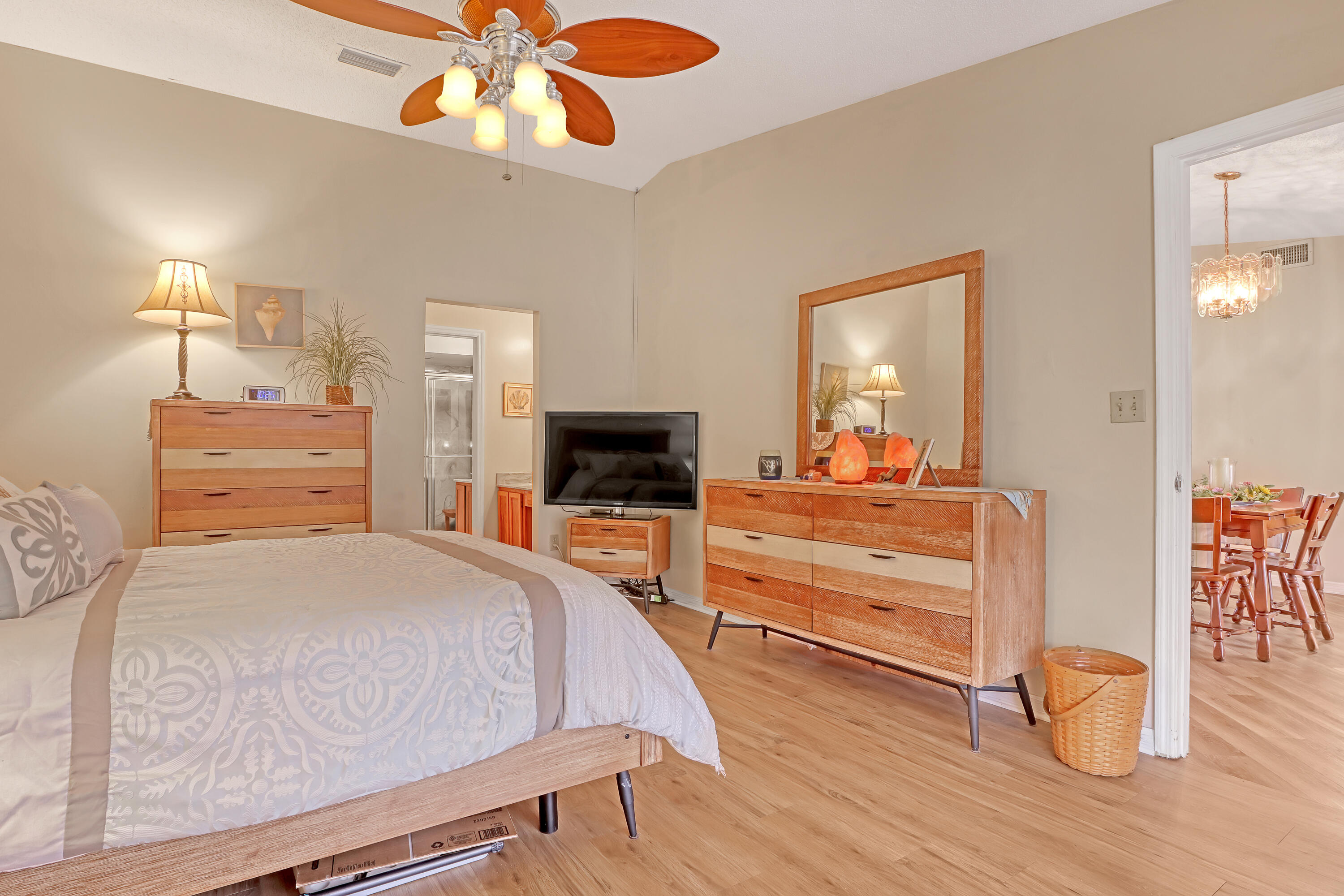 2160 Winston Drive Cocoa, FL 32926 - Photo 25 of 52 a bedroom with a bed and wooden floor