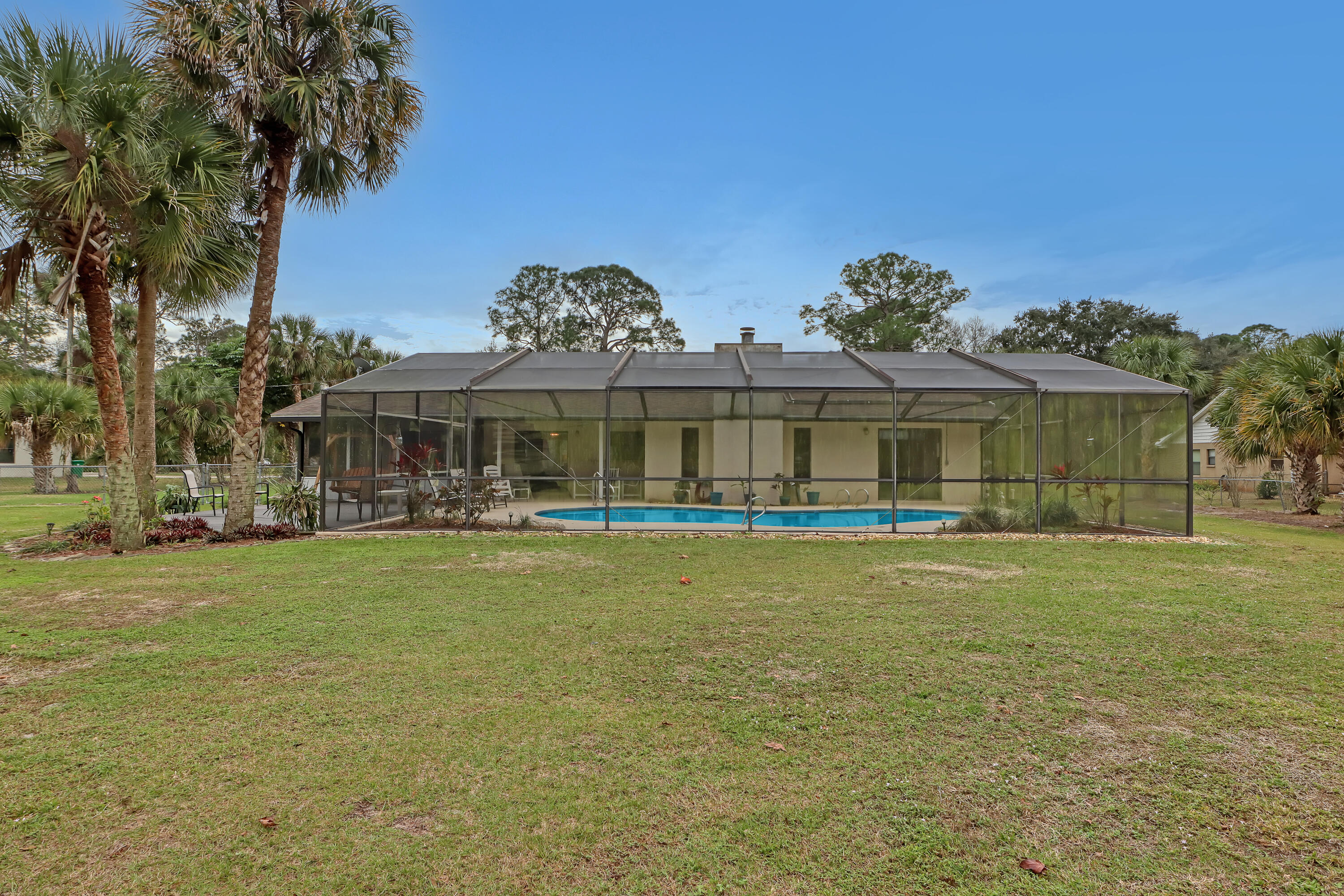 2160 Winston Drive Cocoa, FL 32926 - Photo 46 of 52 a front view of a house with a garden