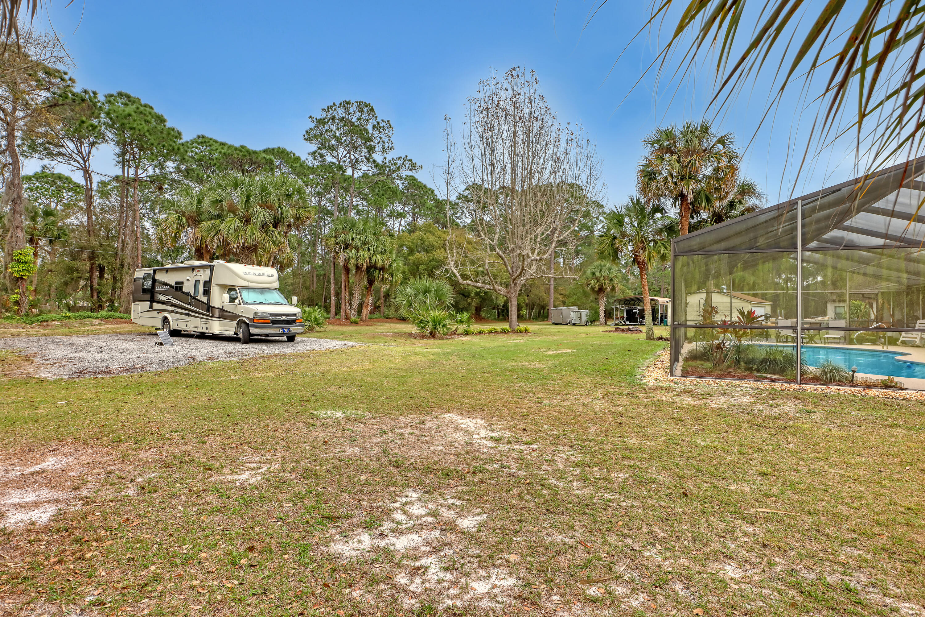 2160 Winston Drive Cocoa, FL 32926 - Photo 47 of 52 a view of a house with a yard