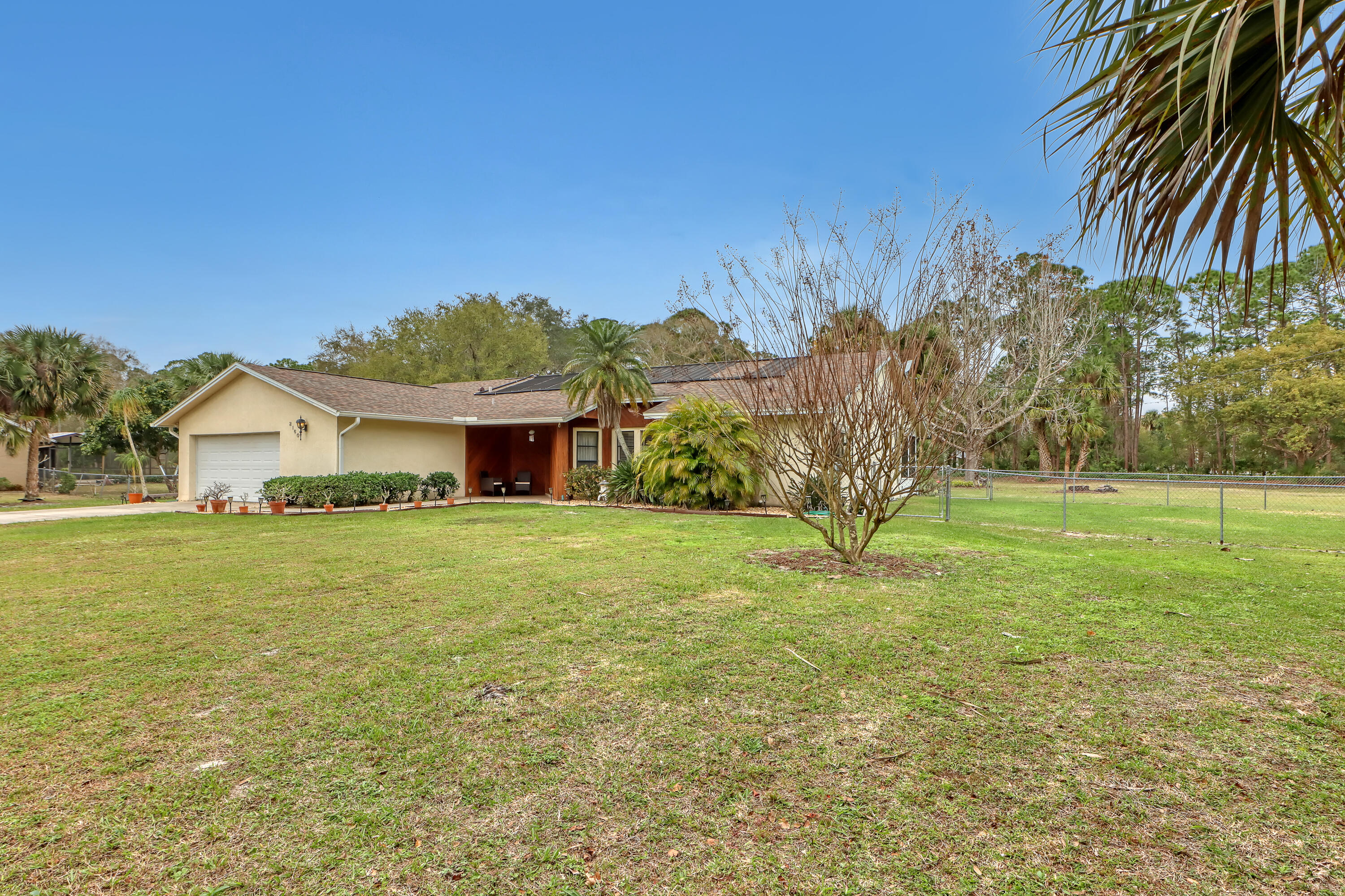 2160 Winston Drive Cocoa, FL 32926 - Photo 51 of 52 a front view of a house with garden