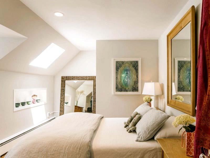 8 Nearwater Road Rowayton, CT 06853 - Photo 20 of 26 a bedroom with a bed and a large window