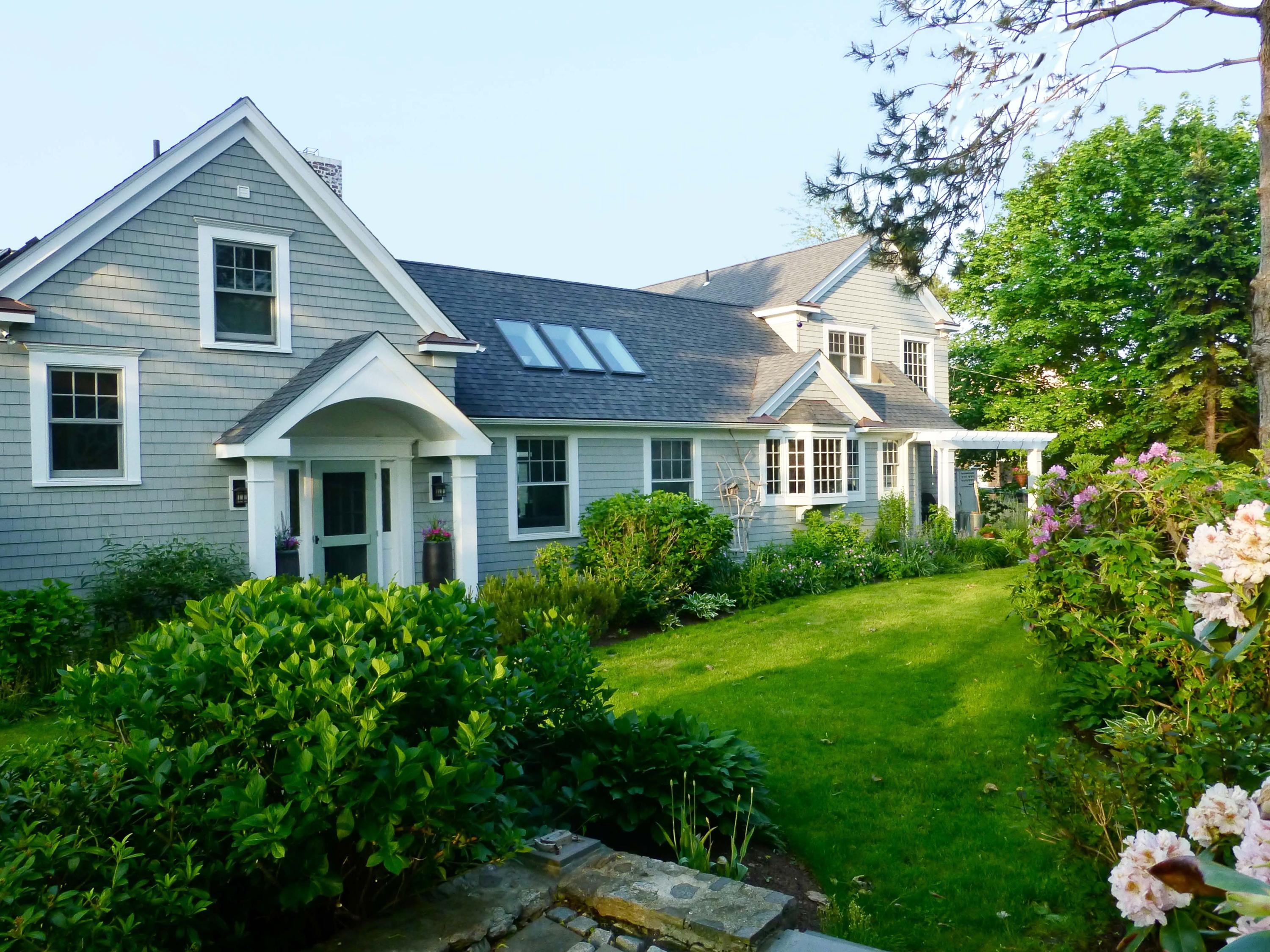 8 Nearwater Road Rowayton, CT 06853 - Photo 26 of 26 a front view of a house with a yard