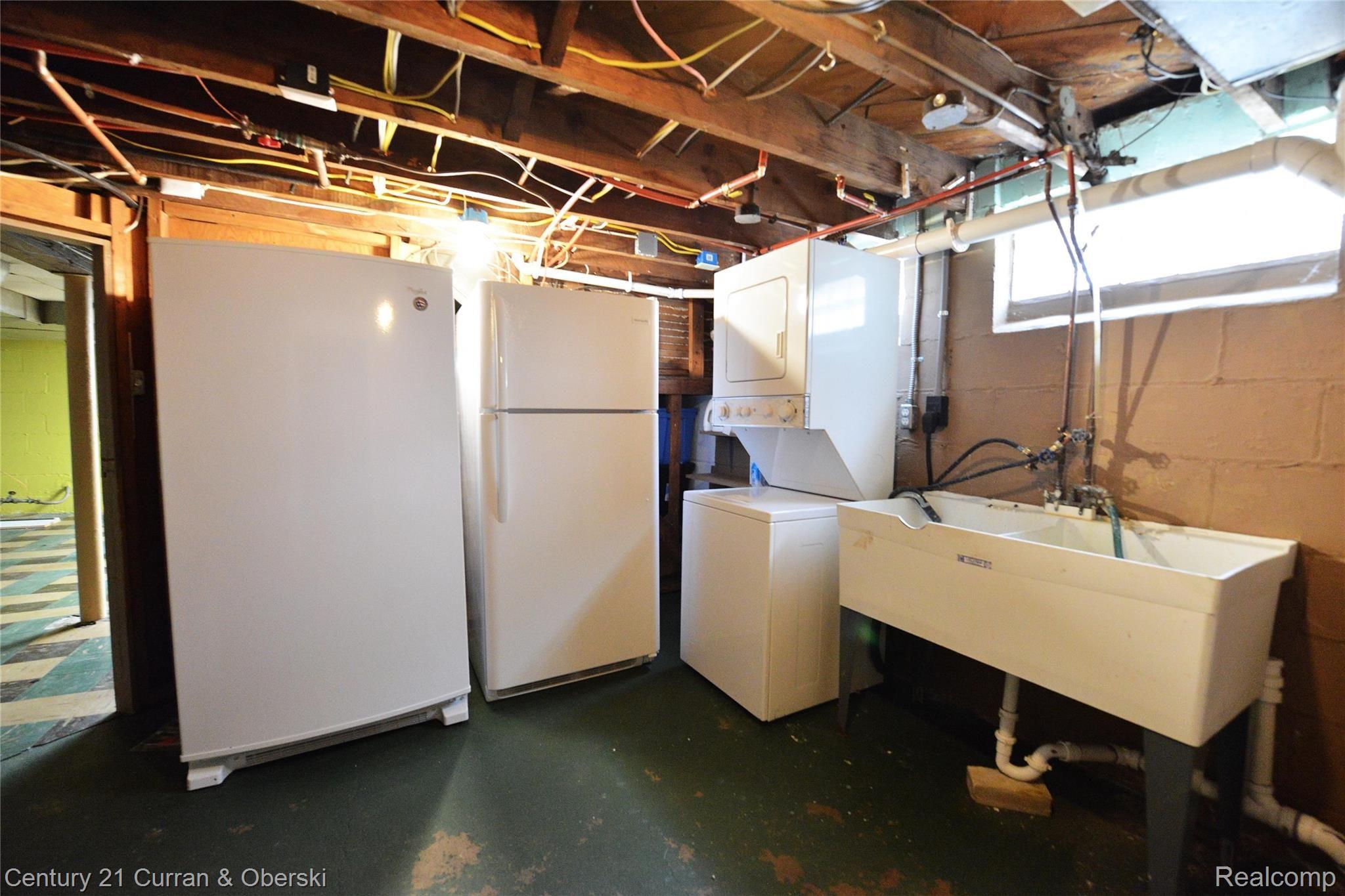 35 Amherst Road Pleasant Ridge, MI 48069 - Photo 40 of 57 Basement - Freezer and extra refrigerator, plus washer/dryer stays