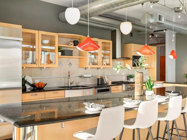 a kitchen with a sink and counter space