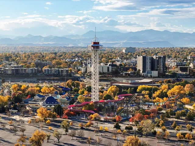 a view of a city with tall buildings