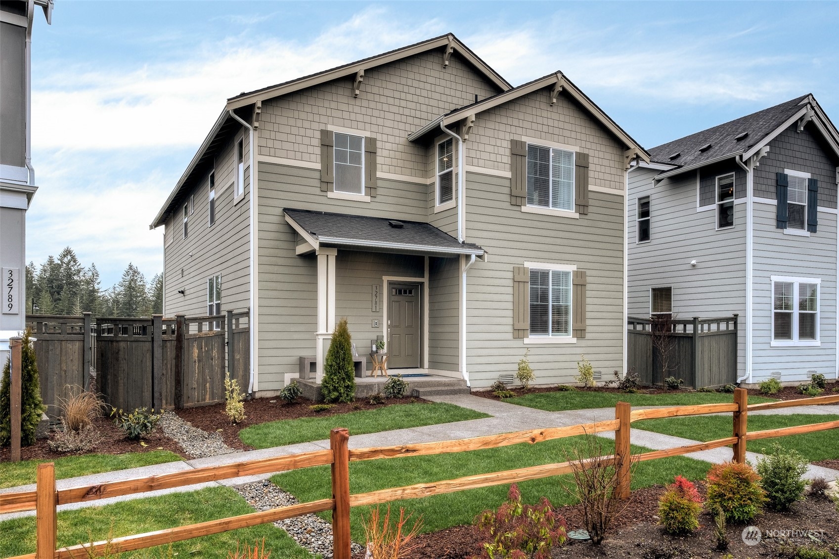 1607 Sultan Basin Road, Unit 1167 Sultan, WA 98294 - Photo 1 of 18 a front view of a house with garden