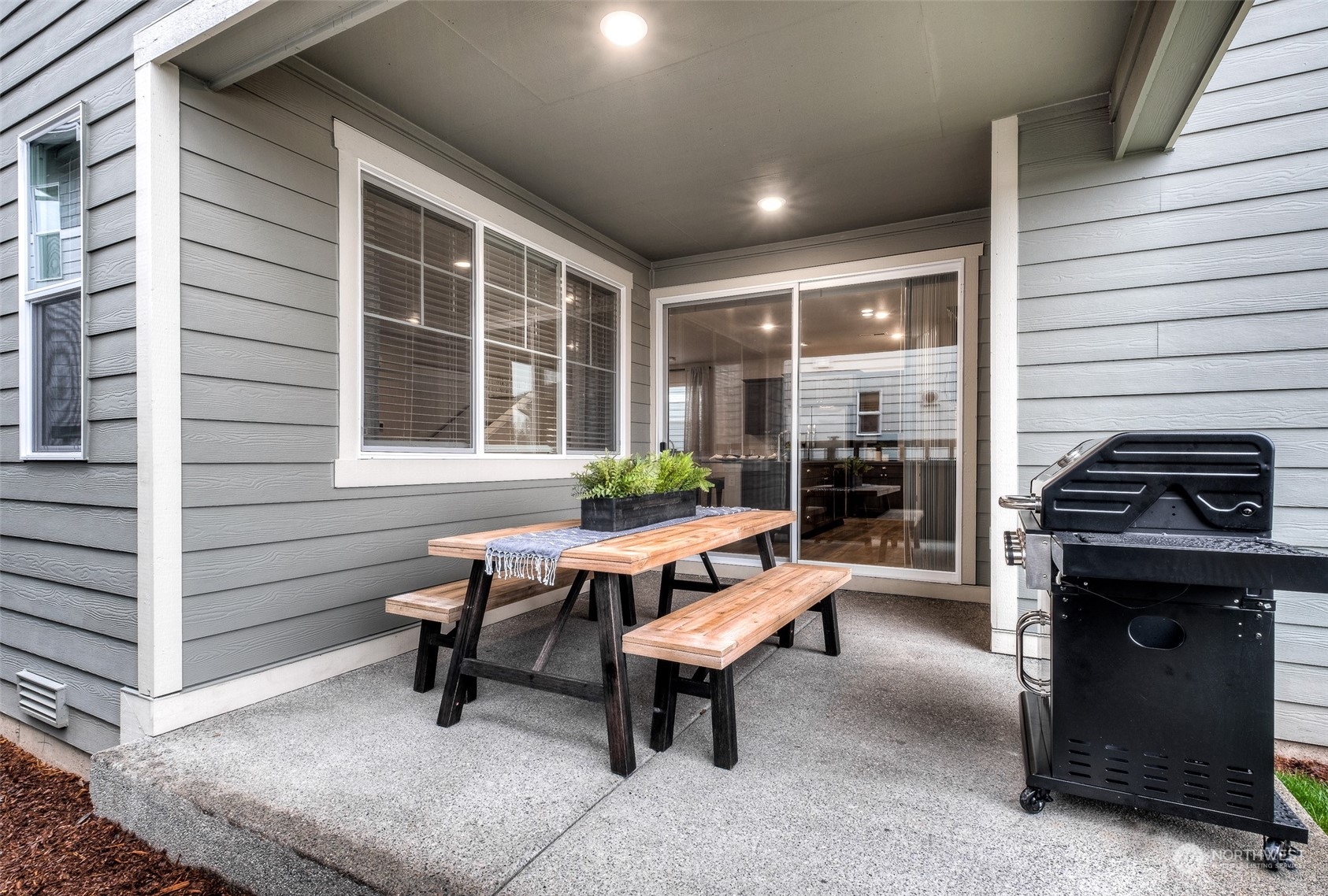 1607 Sultan Basin Road, Unit 1167 Sultan, WA 98294 - Photo 18 of 18 a backyard of a house with outdoor seating