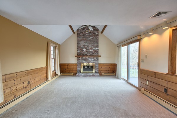 37 Bailey Road Andover, MA 01810 - Photo 15 of 30 a view of an empty room with furniture and floor to ceiling window