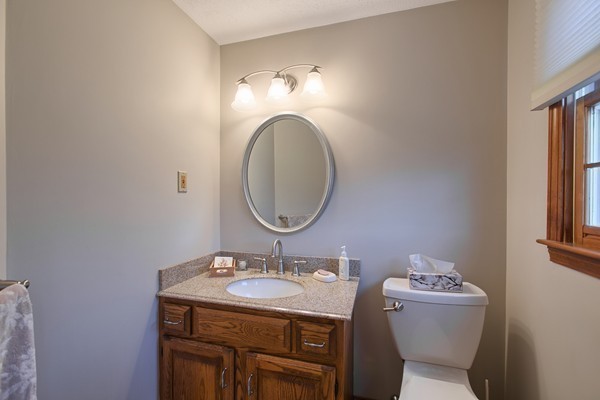 37 Bailey Road Andover, MA 01810 - Photo 16 of 30 a bathroom with a sink and a mirror