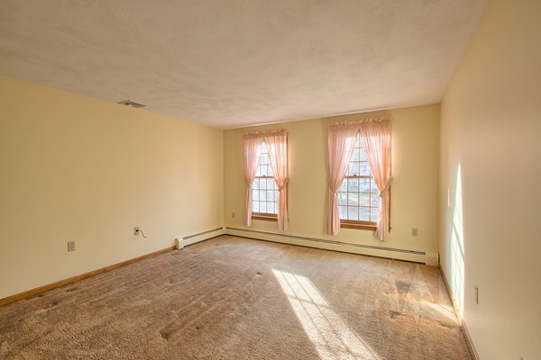 37 Bailey Road Andover, MA 01810 - Photo 18 of 30 a view of an empty room with a window