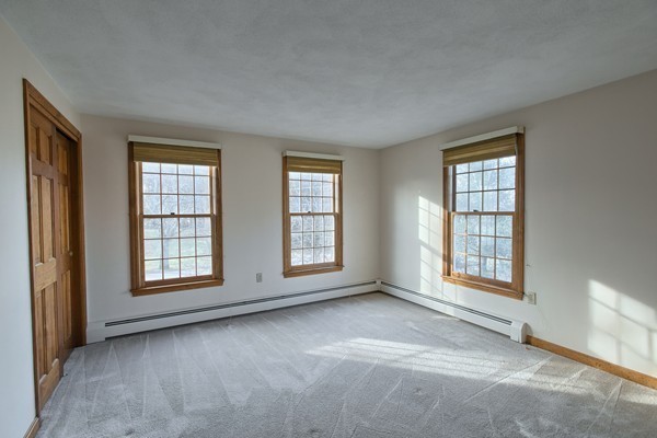 37 Bailey Road Andover, MA 01810 - Photo 20 of 30 an empty room with windows