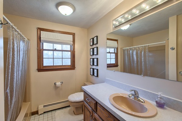 37 Bailey Road Andover, MA 01810 - Photo 23 of 30 a bathroom with a sink a toilet and a mirror