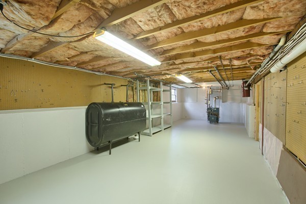 37 Bailey Road Andover, MA 01810 - Photo 26 of 30 a view of a garage with furniture