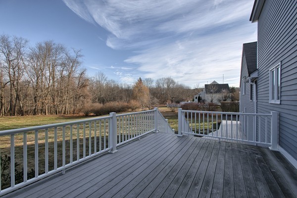 37 Bailey Road Andover, MA 01810 - Photo 28 of 30 a view of balcony with wooden floor and fence