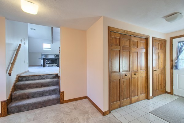 37 Bailey Road Andover, MA 01810 - Photo 7 of 30 a view of a hallway with entryway and stairs