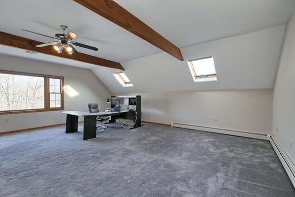 37 Bailey Road Andover, MA 01810 - Photo 9 of 30 an empty room with windows and ceiling fan