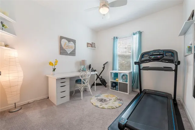 a view of a workspace with furniture