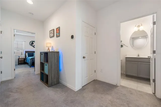 a view of a bathroom with a tub and mirror
