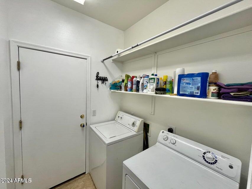 16908 West Northampton Road Surprise, AZ 85374 - Photo 13 of 13 a utility room with dryer and washer