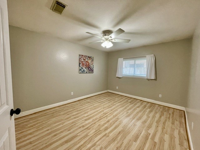 13506 Spring Court Tomball, TX 77375 - Photo 26 of 37 a view of an empty room with a window