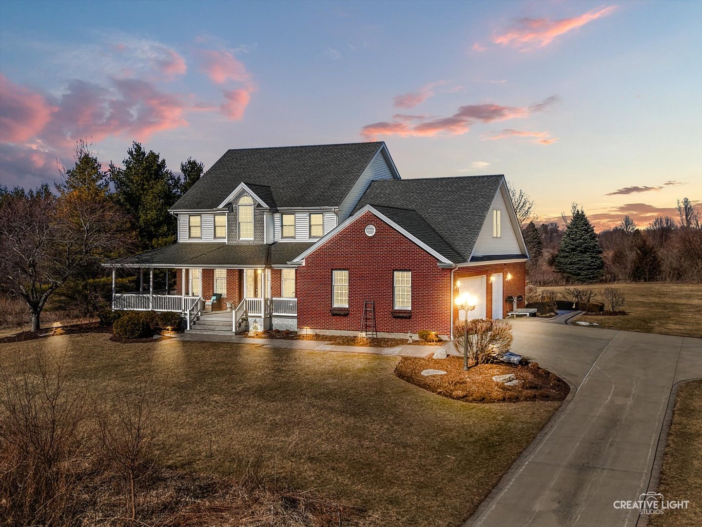 1651 Johnson Road Oswego, IL 60543 - Photo 36 of 60 a front view of a house with a yard