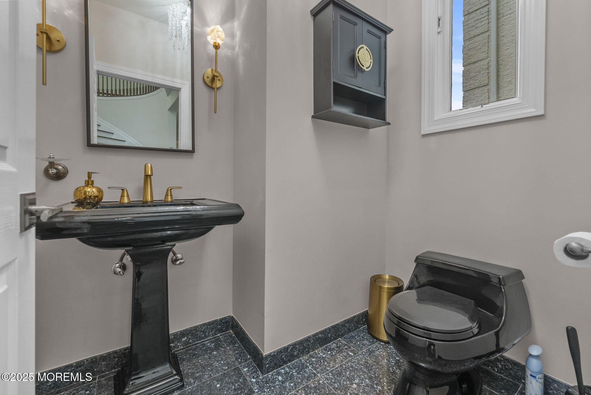 16 Shallow Brook Road Morganville, NJ 07751 - Photo 18 of 37 a bathroom with a sink toilet and a mirror