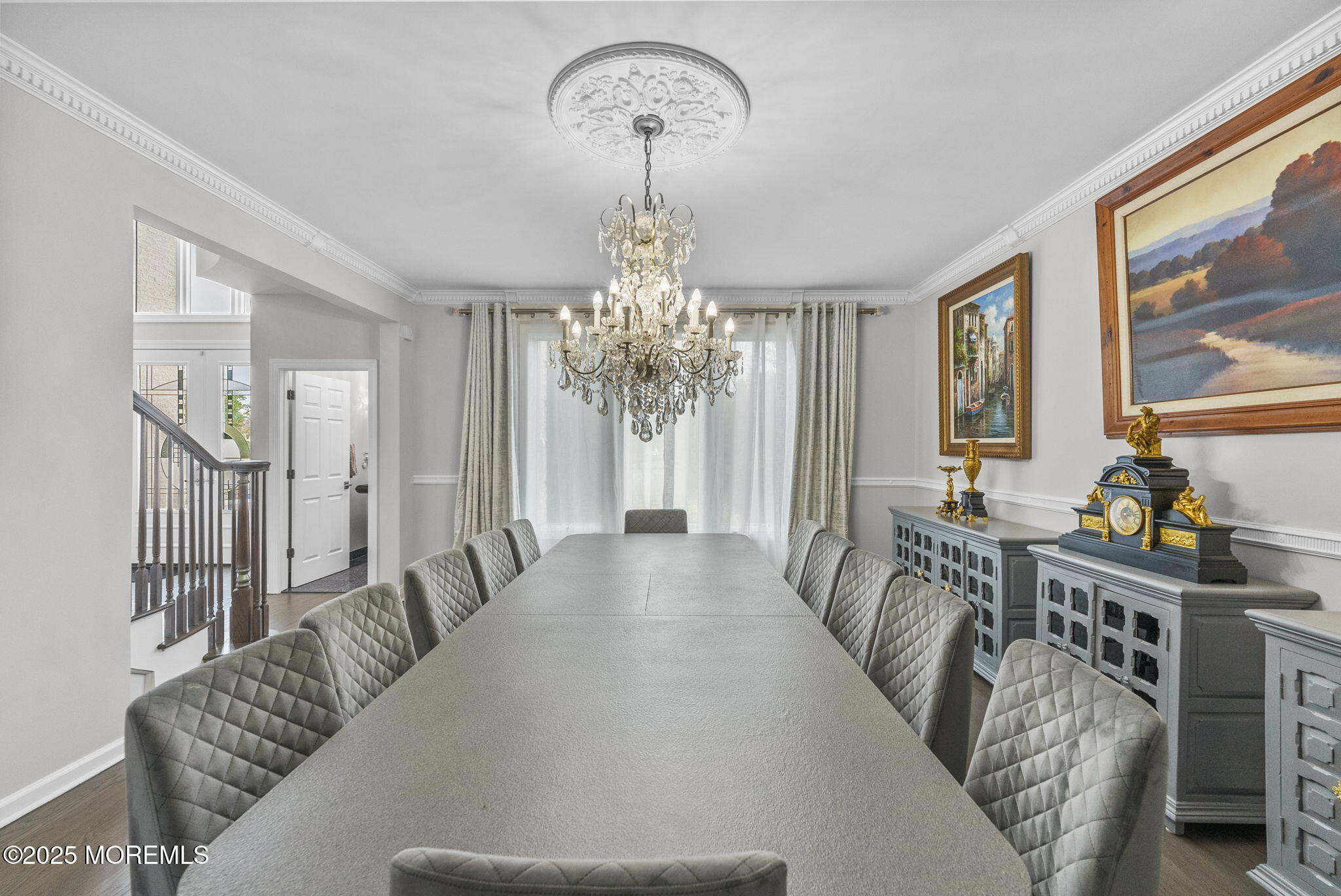 16 Shallow Brook Road Morganville, NJ 07751 - Photo 19 of 37 a living room with furniture chandelier and a chandelier