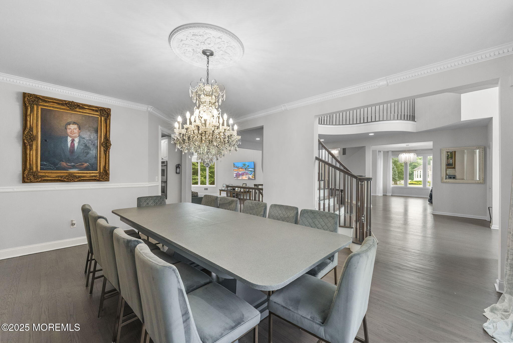16 Shallow Brook Road Morganville, NJ 07751 - Photo 20 of 37 a view of a dining room with furniture and wooden floor