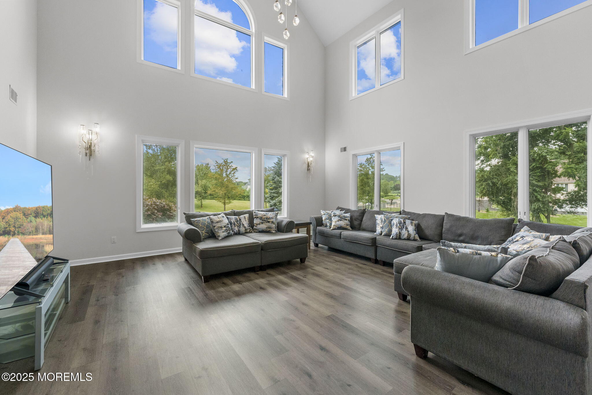 16 Shallow Brook Road Morganville, NJ 07751 - Photo 32 of 37 a living room with furniture and a large window