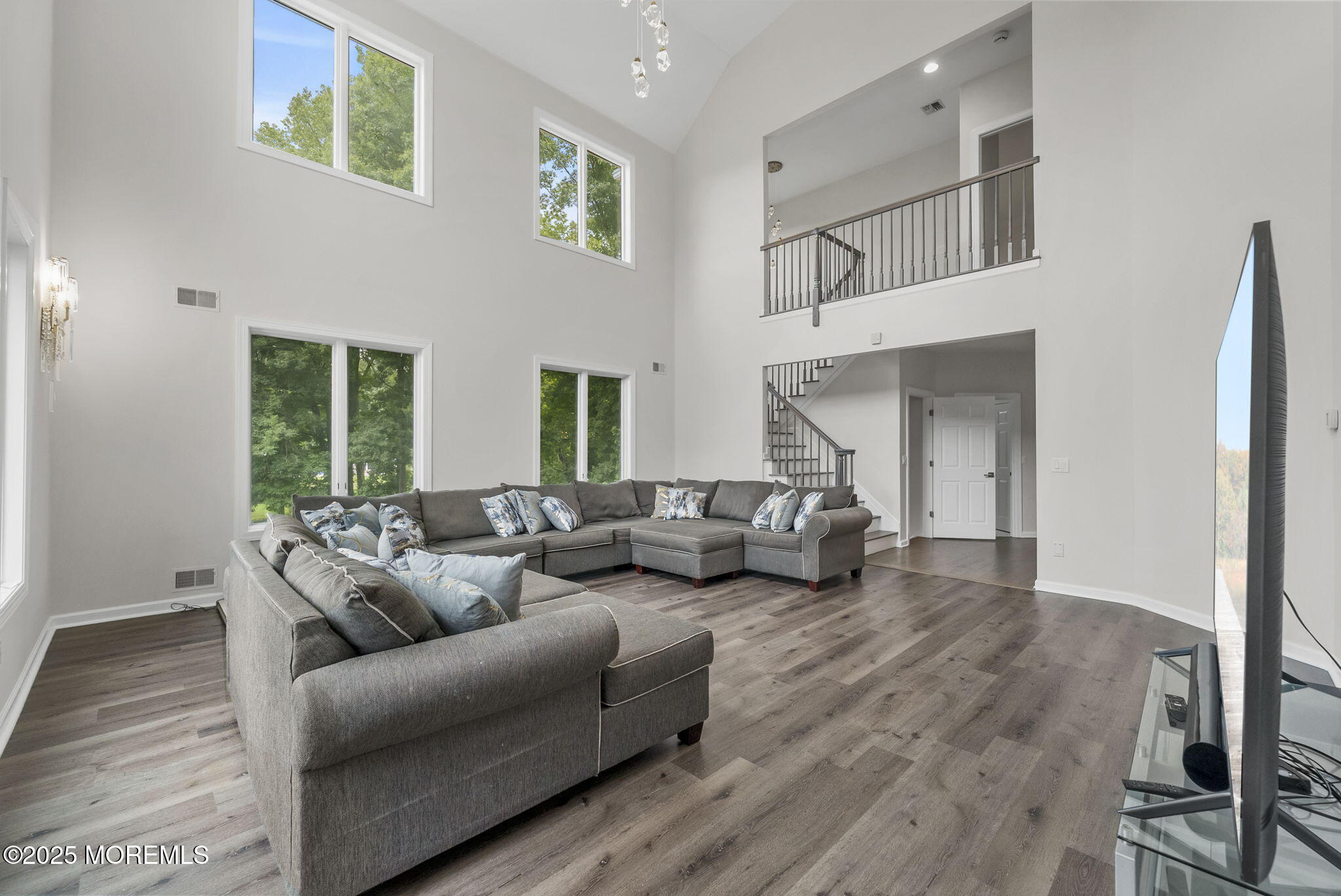 16 Shallow Brook Road Morganville, NJ 07751 - Photo 33 of 37 a living room with furniture and a large window