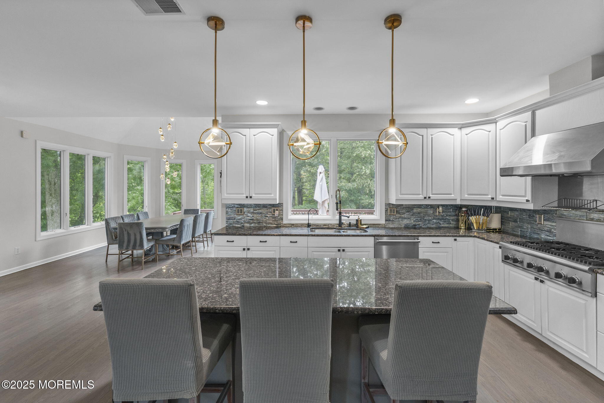 16 Shallow Brook Road Morganville, NJ 07751 - Photo 37 of 37 a large kitchen with kitchen island a large island in it