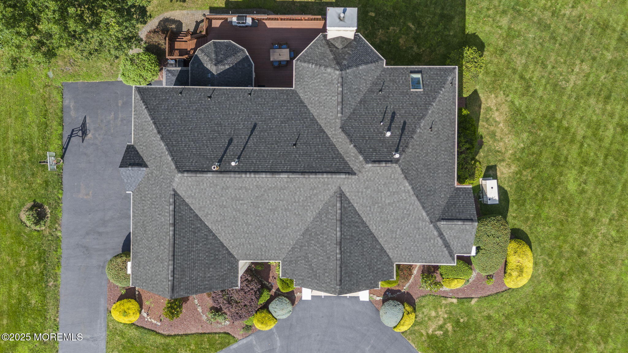 16 Shallow Brook Road Morganville, NJ 07751 - Photo 5 of 37 an aerial view of a house with garden space and street view