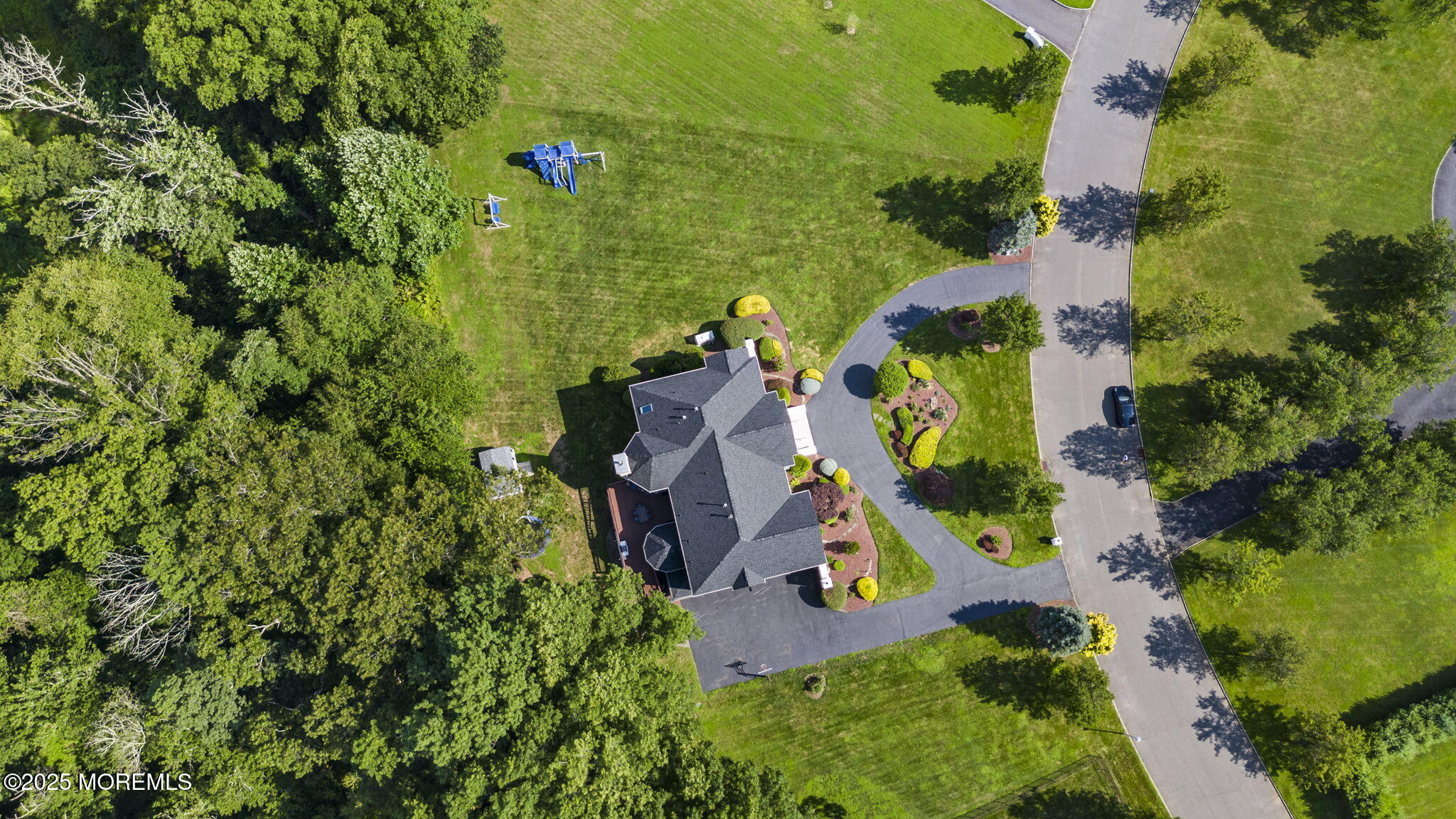 16 Shallow Brook Road Morganville, NJ 07751 - Photo 10 of 37 an aerial view of residential house with outdoor space and swimming pool