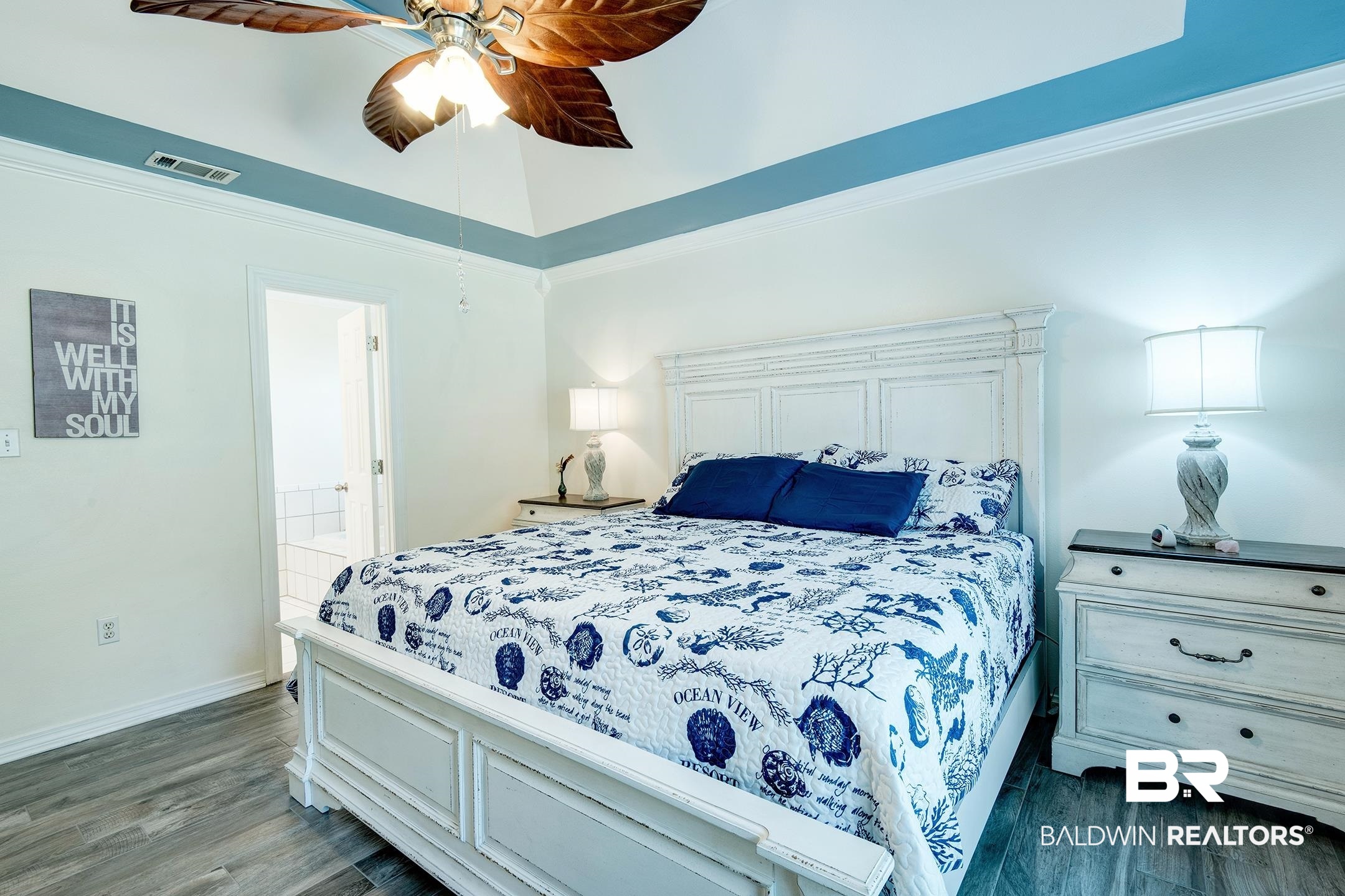 10093 Willis Road Foley, AL 36535 - Photo 9 of 33 Bedroom featuring ornamental molding, dark wood-style flooring, a ceiling fan, a high ceiling, and ensuite bath