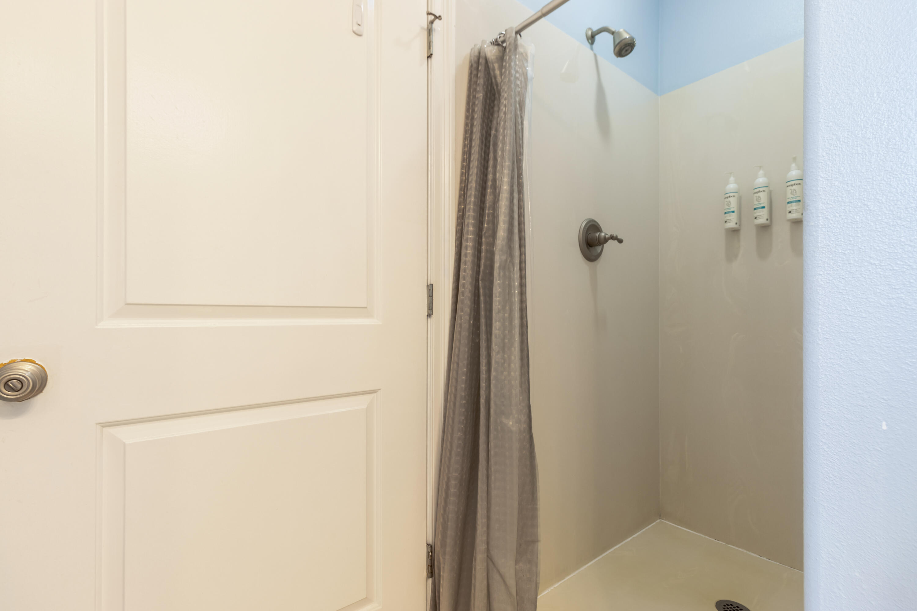 235 Kono Way Destin, FL 32541 - Photo 19 of 42 a bathroom with a shower