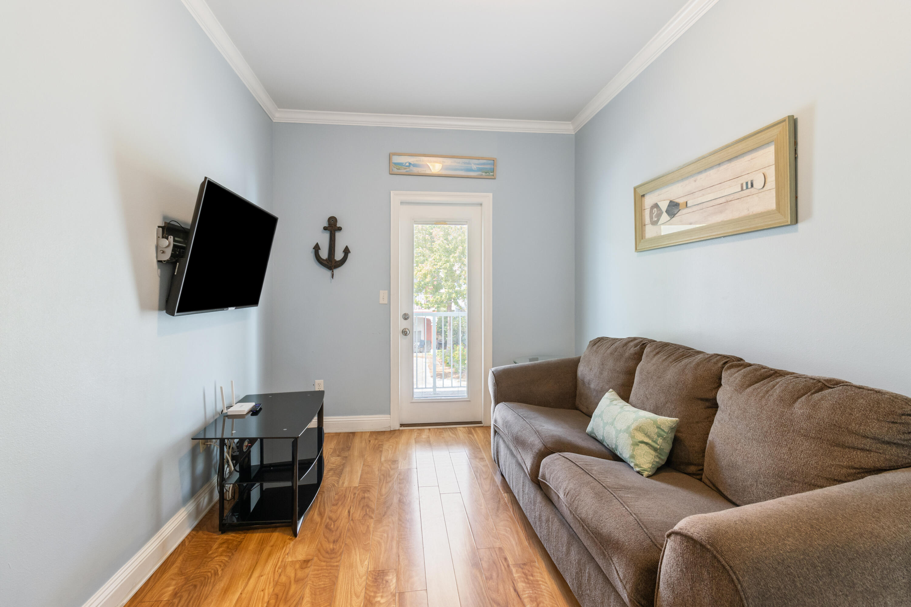 235 Kono Way Destin, FL 32541 - Photo 20 of 42 a living room with furniture and a flat screen tv