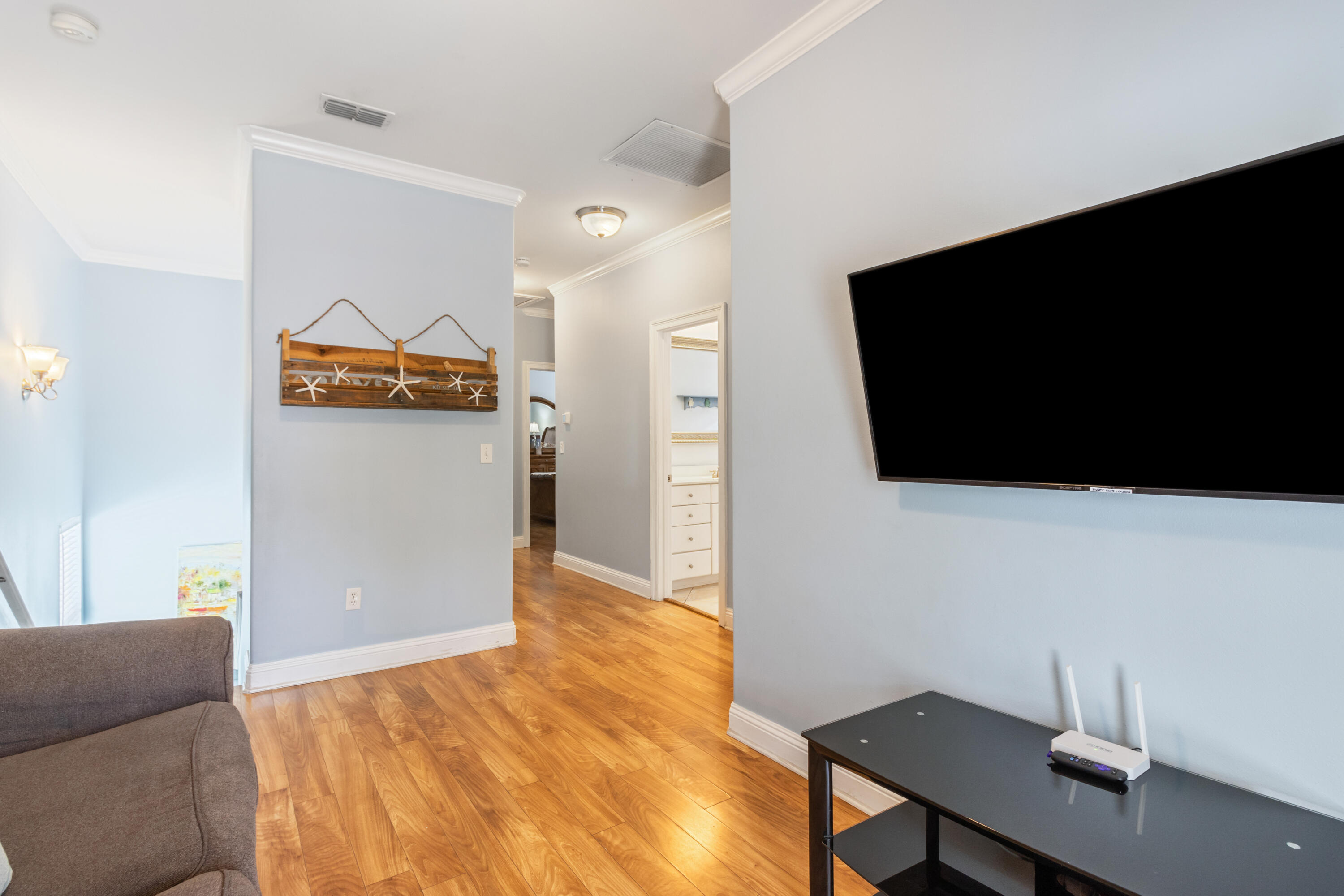 235 Kono Way Destin, FL 32541 - Photo 21 of 42 a living room with furniture and a flat screen tv