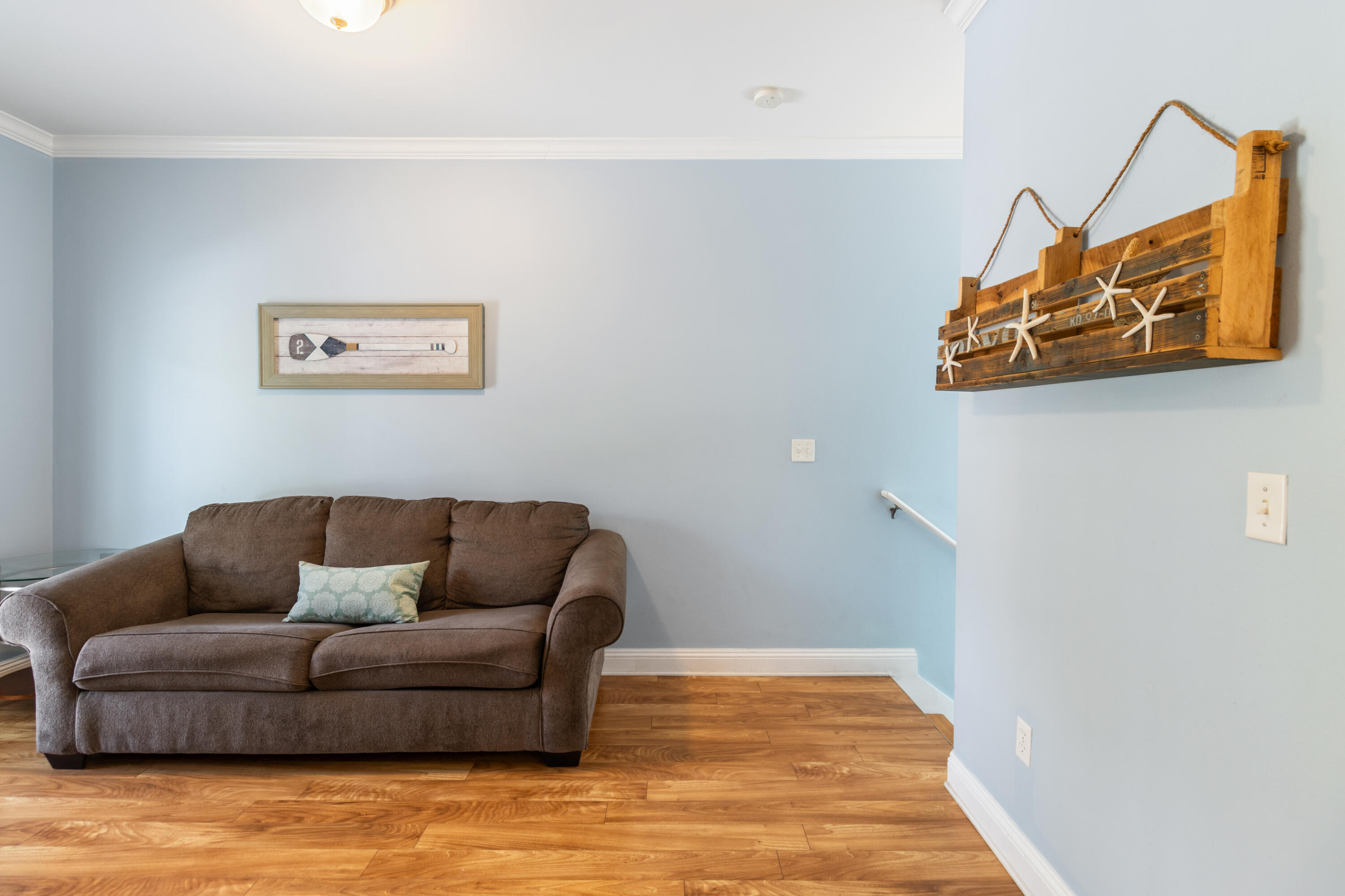 235 Kono Way Destin, FL 32541 - Photo 24 of 42 a living room with furniture and a wooden floor