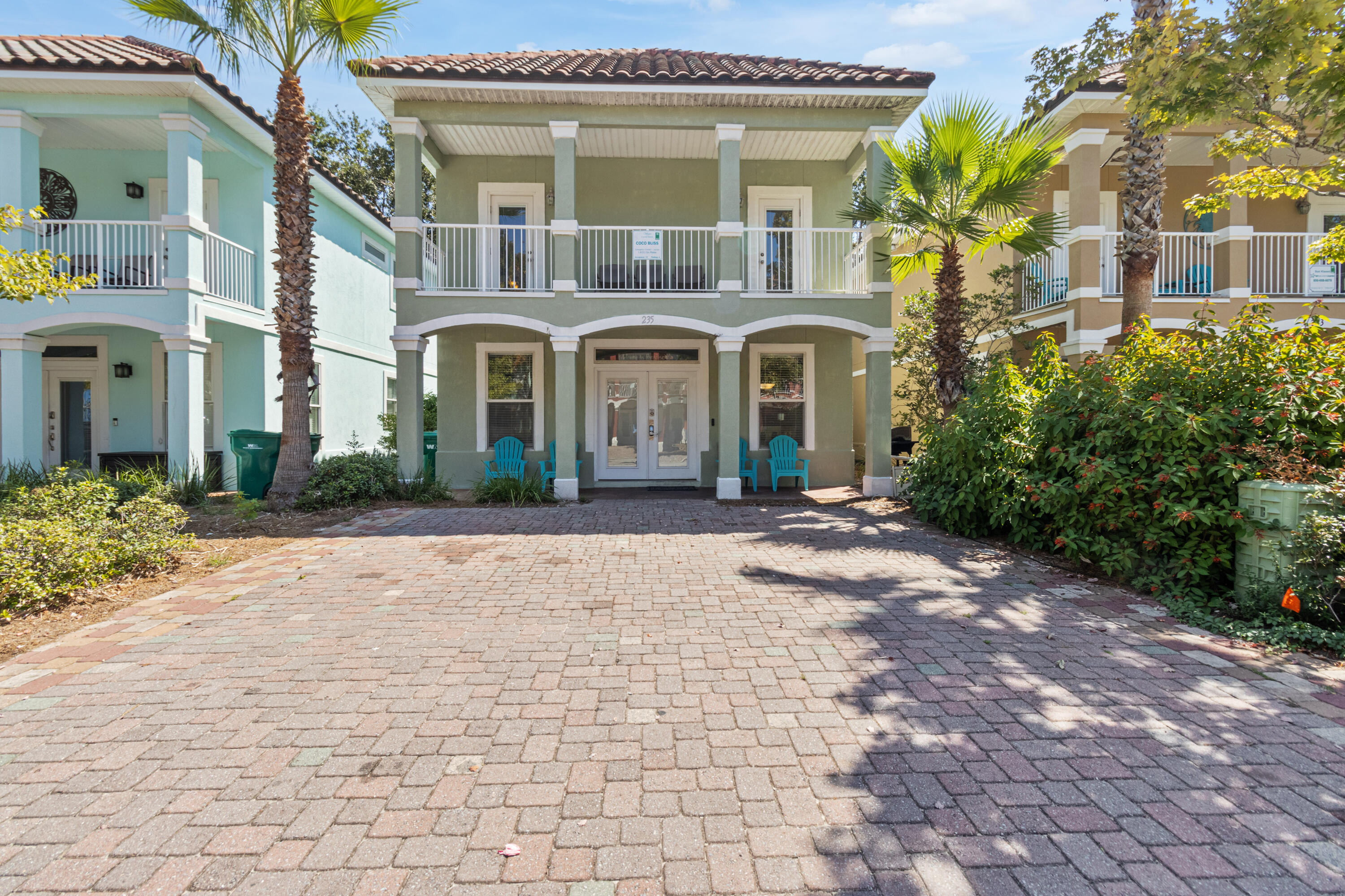 235 Kono Way Destin, FL 32541 - Photo 3 of 42 a front view of a house with garden